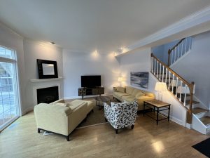 Living room with yellow couch.